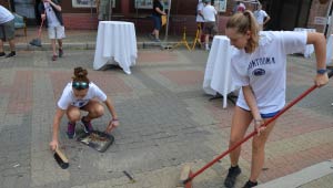 Penn State Altoona students sweeping downtown.
