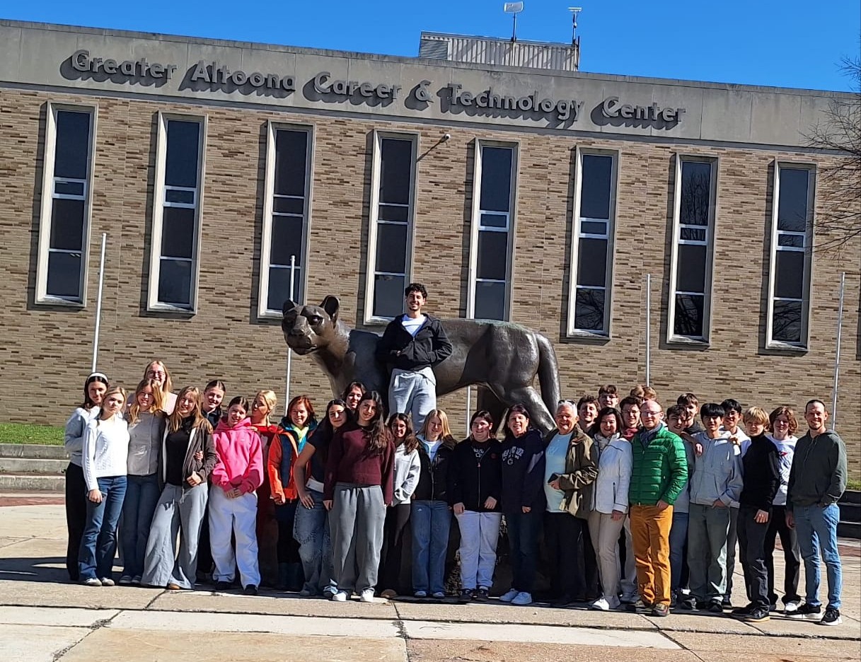 St. Poelten Students in front of the mountain lion near the Altoona Area High School.