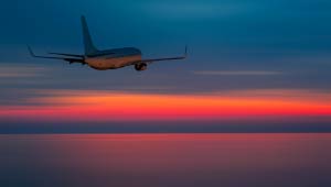 Picture of an airplane flying in the sky.