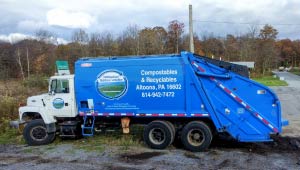 A picture of the IRC recycling garbage truck.