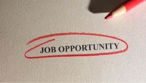 Job Opportunity printed on a paper circled with a red pencil